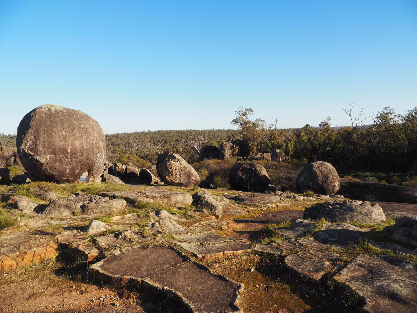Awfully spherical boulder.