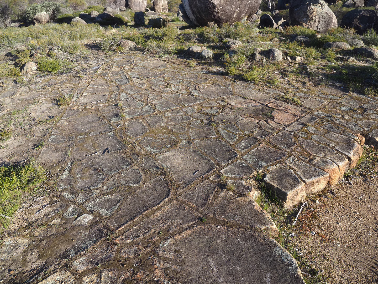 Natural jointing in the granite that looks like a paved / tiled surface